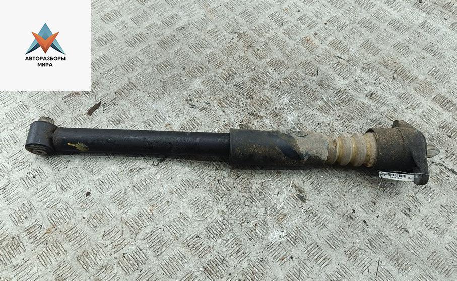 амортизатор задний левый Volkswagen Passat B5 1998, 1.6 л., бензин, МКПП, синий, универсал - фото №1