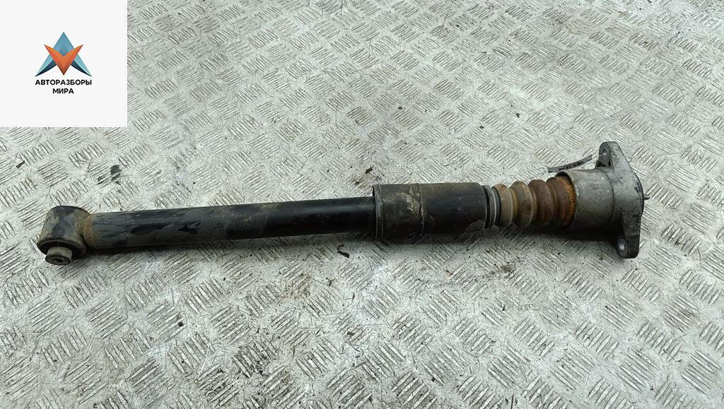 амортизатор задний левый Volkswagen Passat B5 1998, 1.8 л., бензин, МКПП, синий, универсал - фото №1