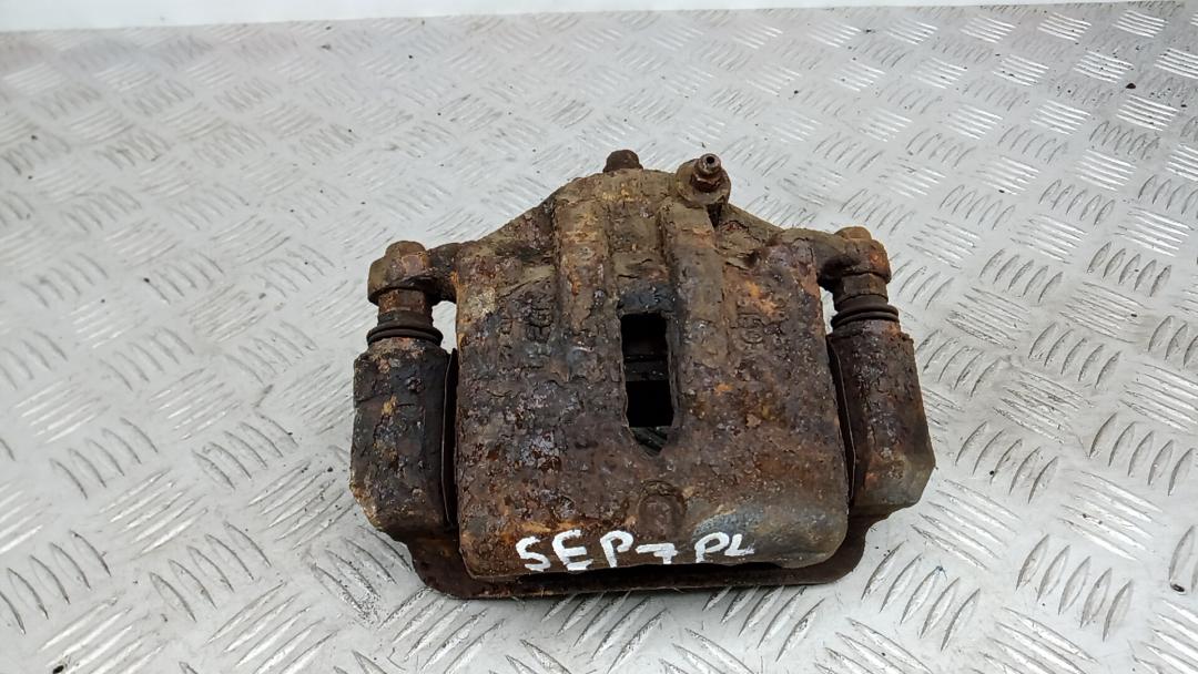 суппорт передний левый Hyundai ix35 1 поколение 2012, 1.7 л., дизель, МКПП, внедорожник 5 дв., 581102Y000, 581802SA70 - фото №1