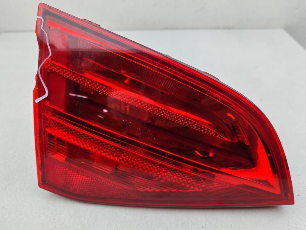 фонарь крышки багажника левый Audi A4 B8 2009, 2.0 л., дизель, МКПП, чёрный, универсал, 21969002