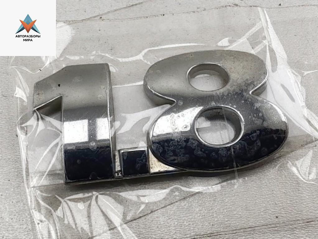 эмблема Volkswagen Passat B5 1999, 1.8 л., бензин, МКПП, синий, универсал - фото №1