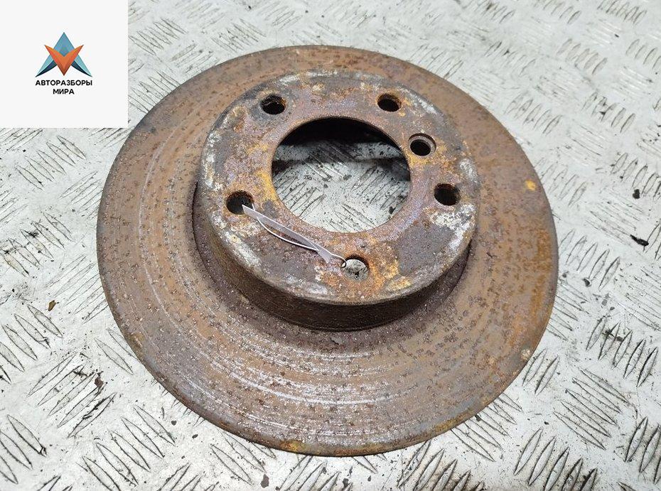 диск тормозной передний BMW 3 серия E36 1994, 1.6 л., бензин, МКПП, чёрный, хетчбэк 3 дв. - фото №1