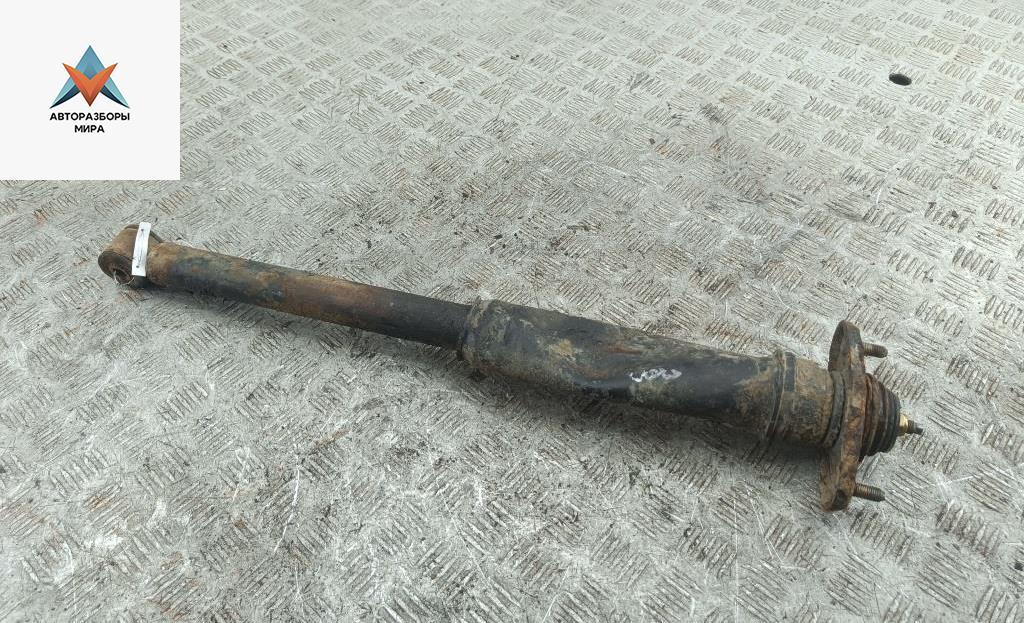 амортизатор задний левый Mitsubishi Space Wagon 3 поколение (Typ N50) 1999, 2.4 л., бензин, МКПП, серый, минивэн, MR319243 - фото №1