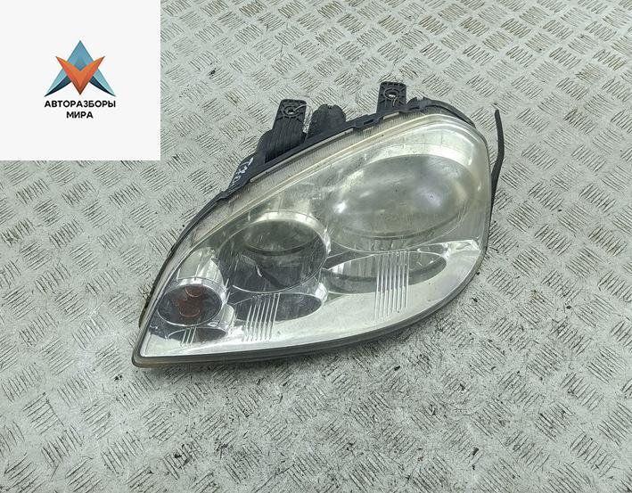 фара левая Chevrolet Nubira 1 поколение 2007, 2.0 л., дизель, МКПП, чёрный, универсал, 0301-001909 - фото №1