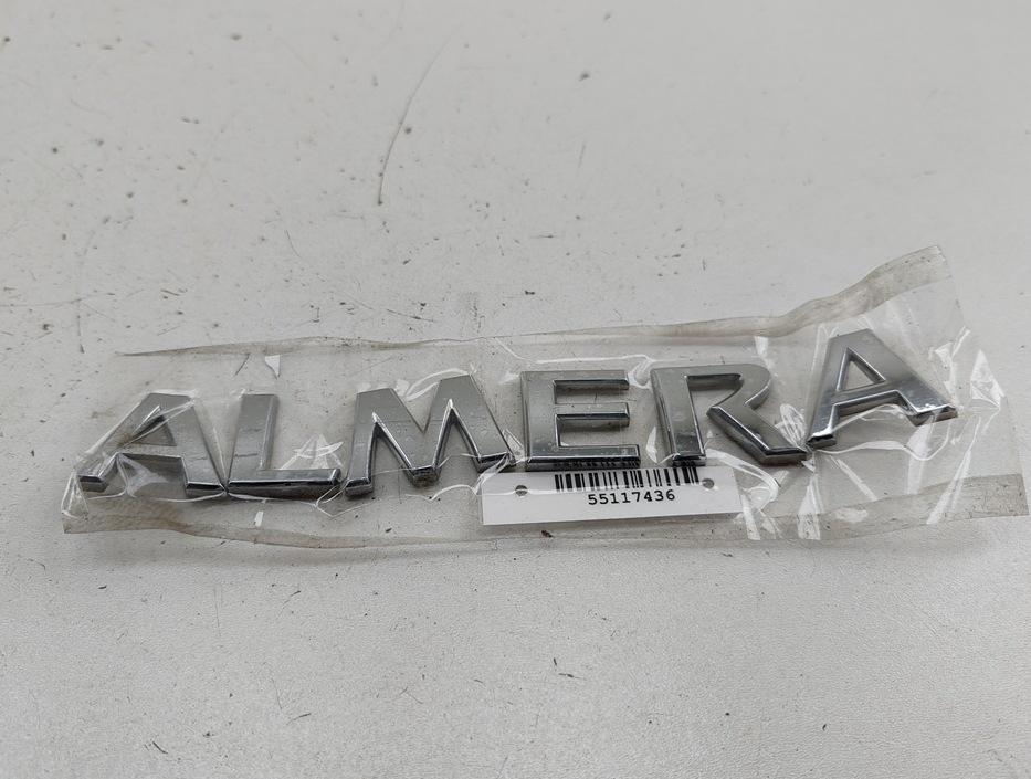 эмблема Nissan Almera N16 2005, 1.5 л., бензин, МКПП, серый, хетчбэк 5 дв.