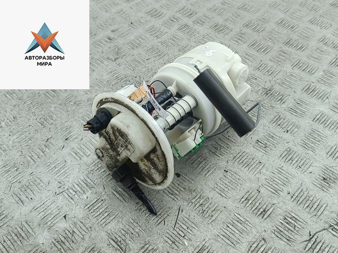 насос топливный Dacia (Renault) Sandero I 2010, 1.4 л., бензин, МКПП, красный, хетчбэк 5 дв. - фото №1