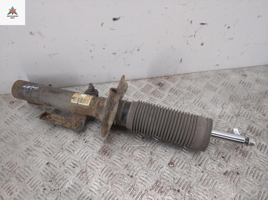 амортизатор передний левый Ford Transit 7 поколение 2008, 2.2 л., дизель, МКПП, красный, микроавтобус, 6C1118045AE - фото №1