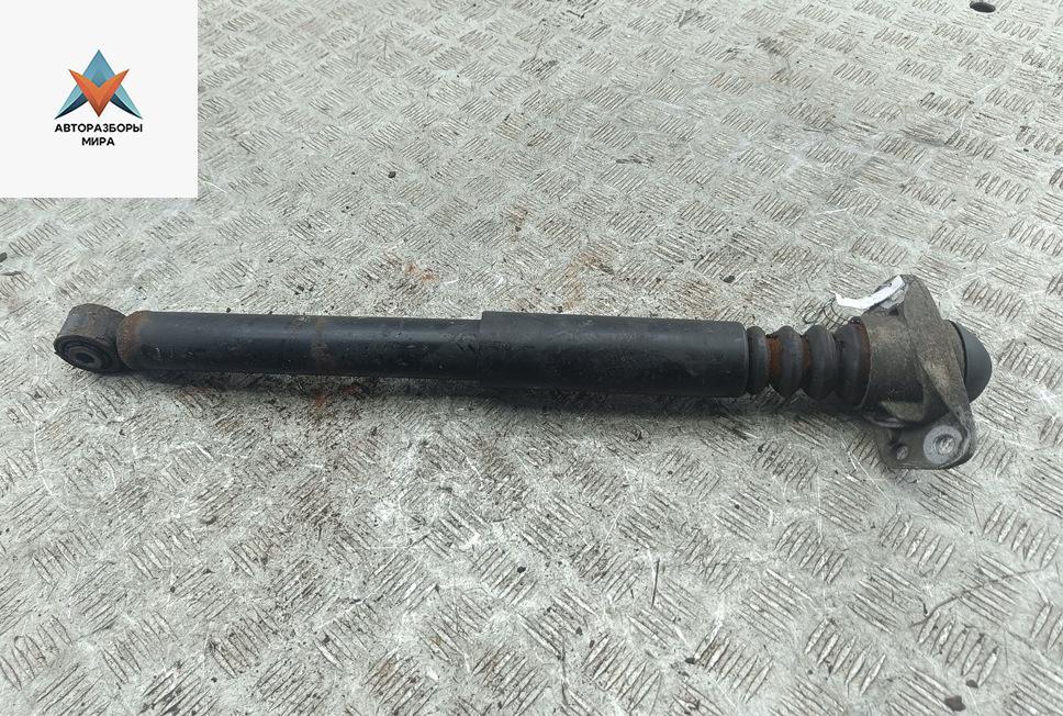 амортизатор задний левый Volkswagen Golf 5 поколение 2004, 1.4 л., бензин, МКПП, чёрный, хетчбэк 3 дв. - фото №1