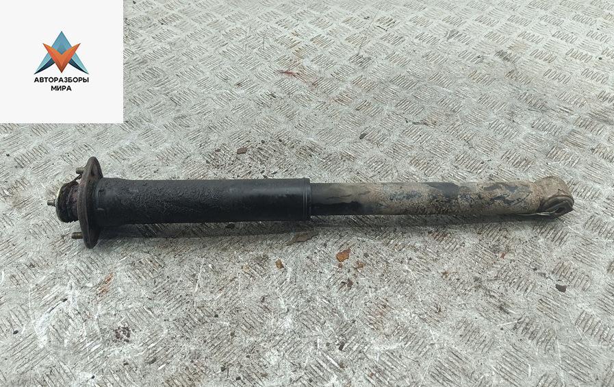 амортизатор задний левый BMW 3 серия E36 1994, 1.6 л., бензин, МКПП, красный, хетчбэк 3 дв. - фото №1