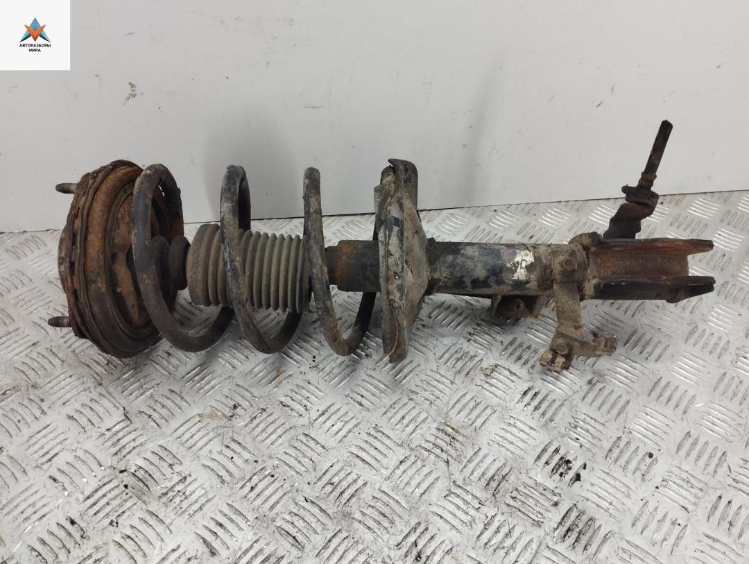 стойка передняя Mitsubishi Space Wagon 3 поколение (Typ N50) 1999, 2.4 л., бензин, МКПП, серый, минивэн - фото №1