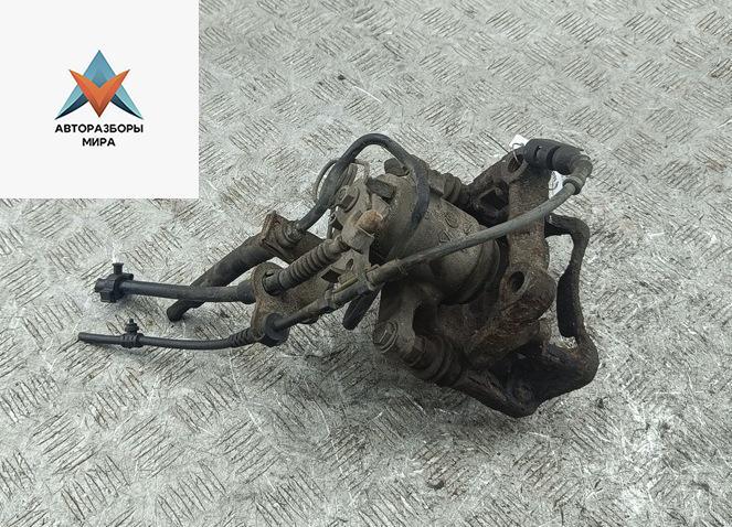 суппорт задний левый Volkswagen Caddy 3 поколение 2005, 1.9 л., дизель, МКПП, серый, фургон - фото №1