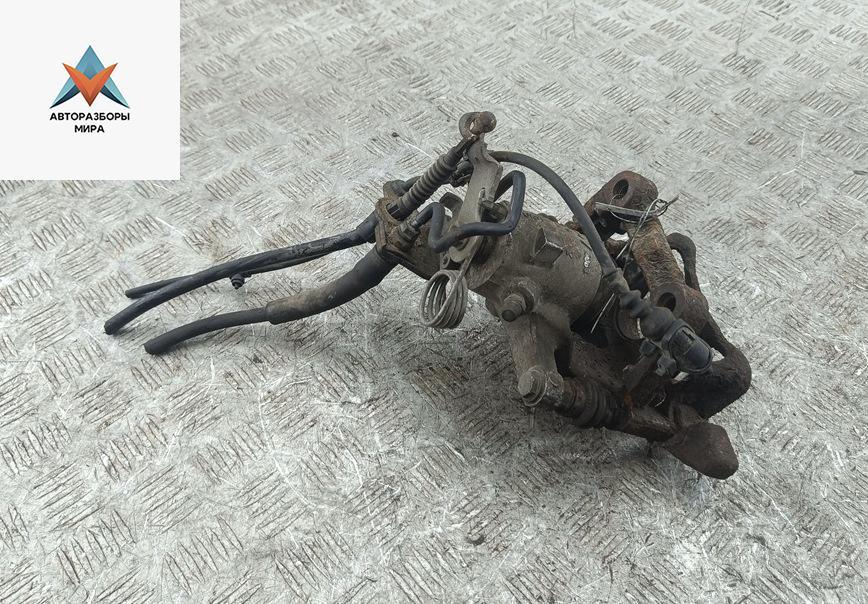 суппорт задний правый Volkswagen Caddy 3 поколение 2005, 1.9 л., дизель, МКПП, серый, фургон - фото №1