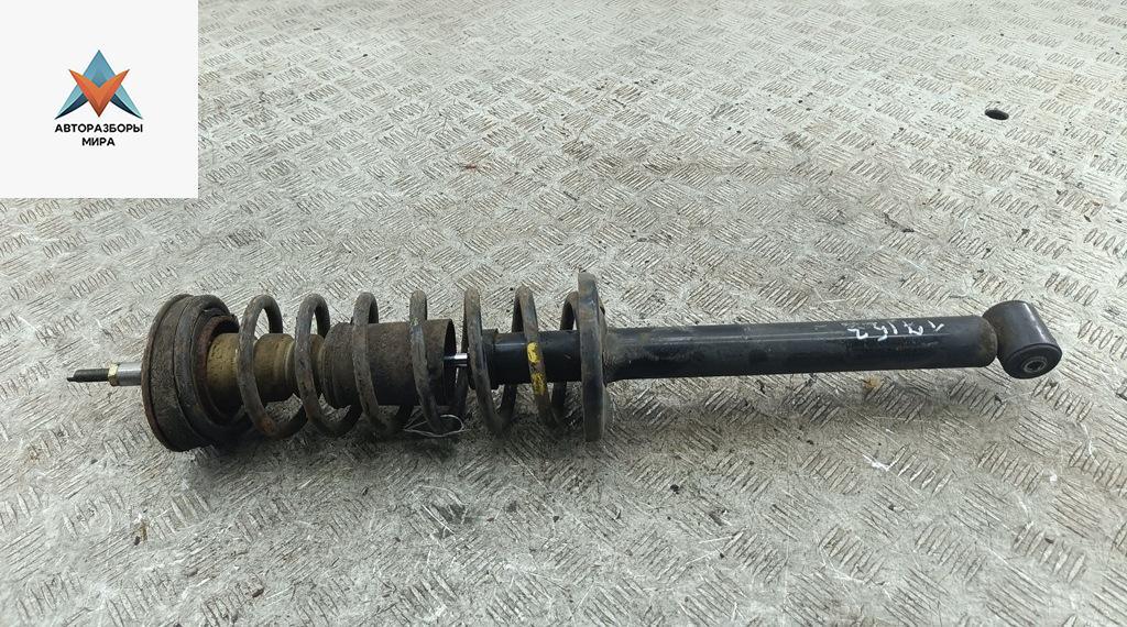 стойка передняя Volkswagen Golf 3 поколение 1994, 1.8 л., бензин, АКПП, красный, хетчбэк 5 дв. - фото №1