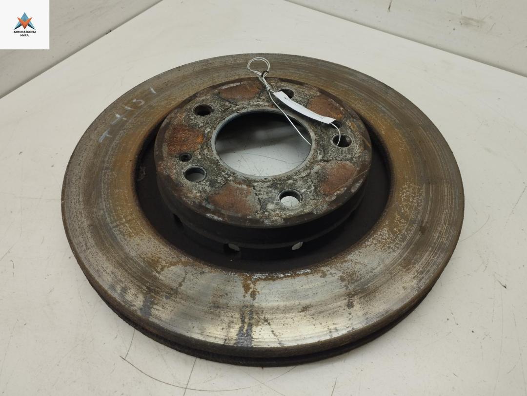 диск тормозной передний Mitsubishi Outlander 1 поколение 2006, 2.0 л., бензин, МКПП, чёрный, внедорожник 5 дв. - фото №1