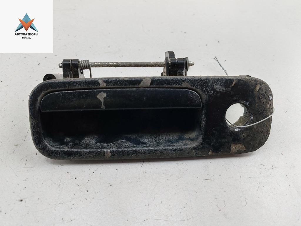 ручка крышки багажника Volkswagen Caddy 3 поколение 2007, красный, фургон, 7M3827565D - фото №1