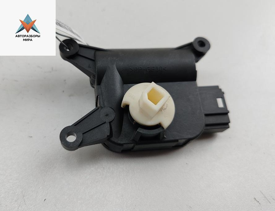 моторчик заслонки печки Skoda Octavia mk2 (A5 1Z) 2005, 1.6 л., бензин, МКПП, чёрный, универсал, 1K1907511G - фото №1