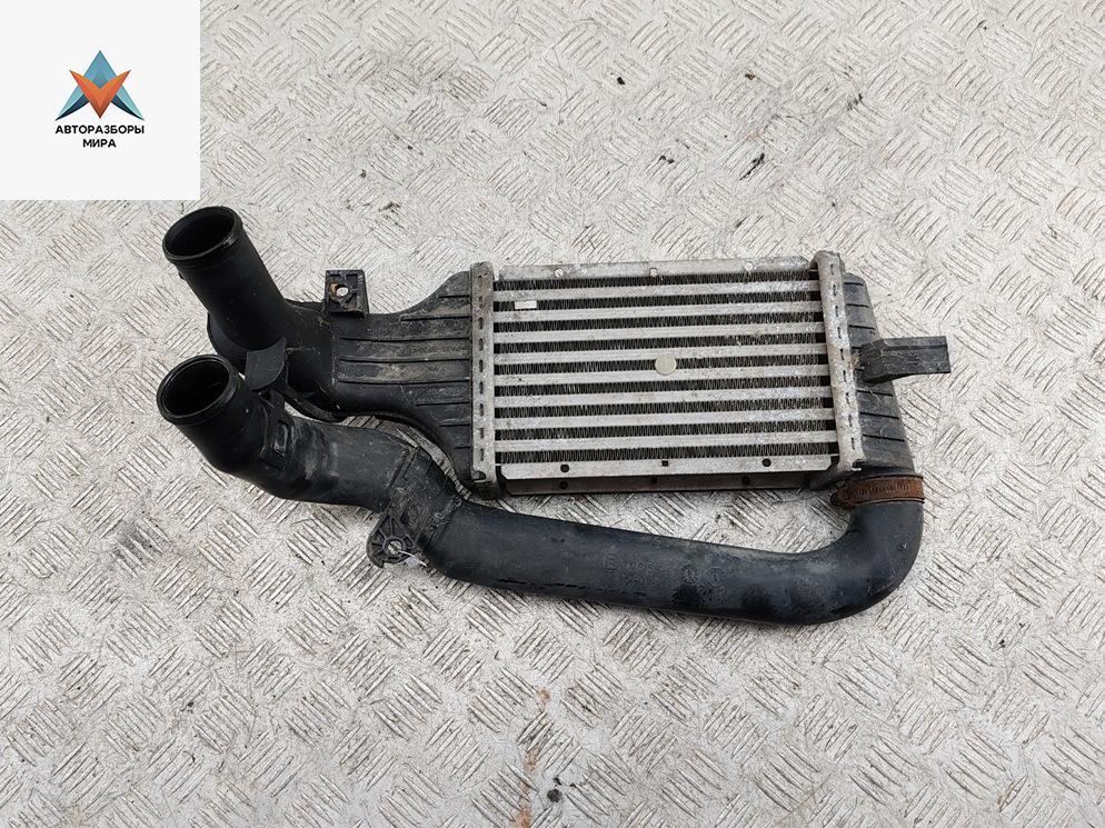 радиатор интеркулера Opel Zafira 1 поколение (A) 2002, 2.2 л., дизель, МКПП, синий, минивэн, 24436438 - фото №1