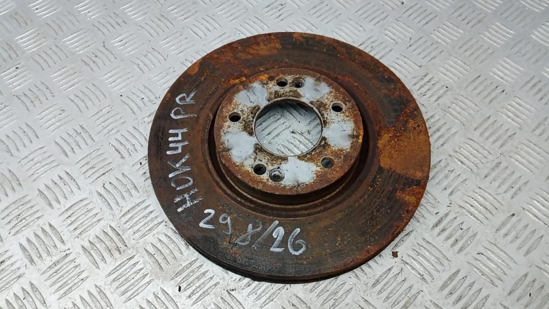 диск тормозной передний Kia Sportage 3 поколение 2010, 1.7 л., дизель, МКПП, внедорожник 5 дв., 517123K160 - фото №1