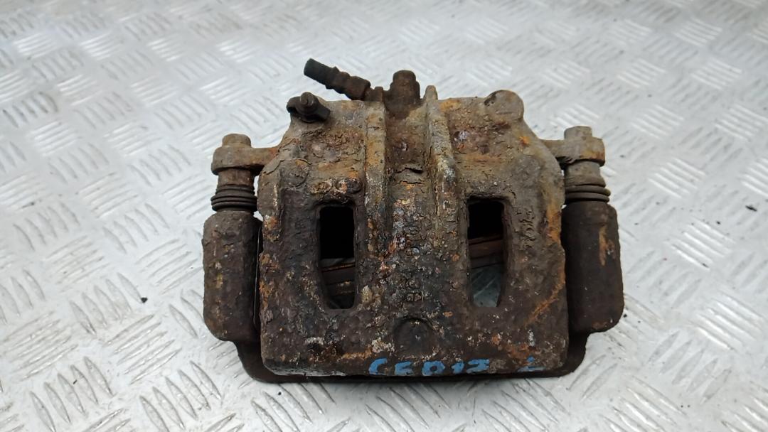 суппорт передний левый Hyundai Santa Fe 2 поколение (CM) 2007, 2.2 л., дизель, МКПП, внедорожник 5 дв. - фото №1