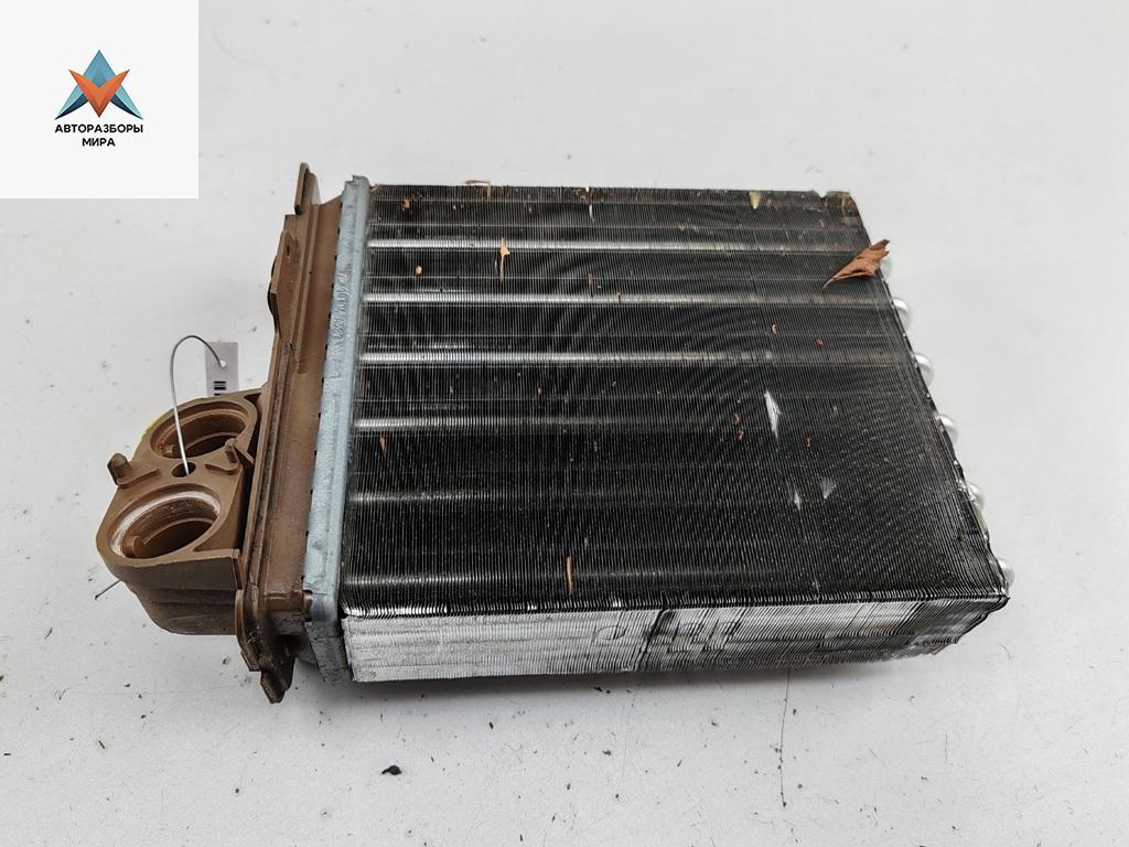 радиатор отопителя (печки) Dacia (Renault) Sandero I 2010, 1.4 л., бензин, МКПП, красный, хетчбэк 5 дв. - фото №1