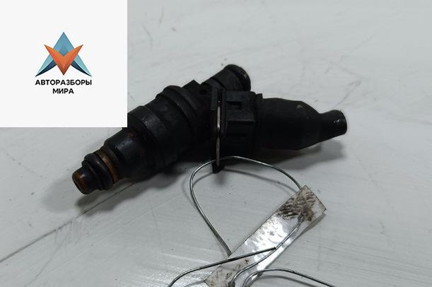 форсунка Volkswagen Passat B5 1998, 1.8 л., бензин, МКПП, зелёный, универсал, 06A906031 - фото №1