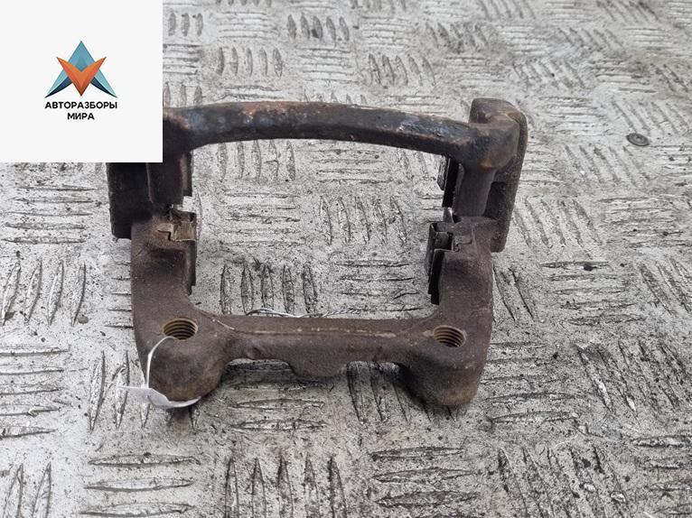 скоба суппорта Volkswagen Touran 1 поколение 2003, 1.9 л., дизель, МКПП, серый, минивэн - фото №1