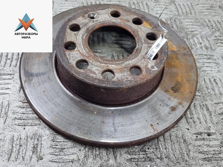 диск тормозной задний Volkswagen Touran 1 поколение 2003, 1.6 л., бензин, МКПП, серый, минивэн - фото №1