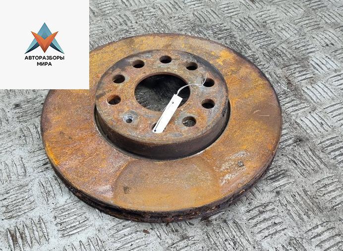 диск тормозной передний Volkswagen Touran 1 поколение 2003, 1.9 л., дизель, МКПП, серый, минивэн - фото №1