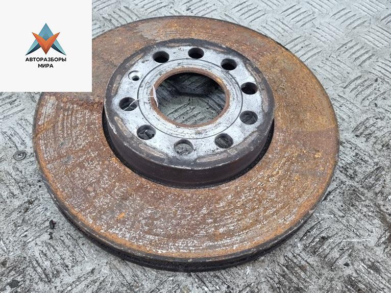 диск тормозной передний Volkswagen Touran 1 поколение 2005, 1.6 л., бензин, МКПП, зелёный, минивэн - фото №1