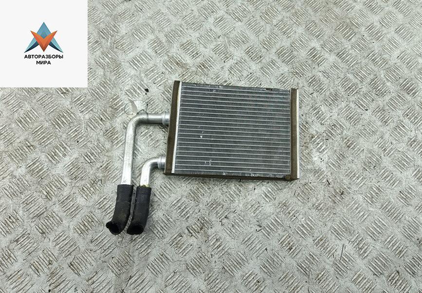 радиатор отопителя (печки) Mitsubishi Outlander 1 поколение 2006, 2.0 л., бензин, МКПП, чёрный, внедорожник 5 дв. - фото №1