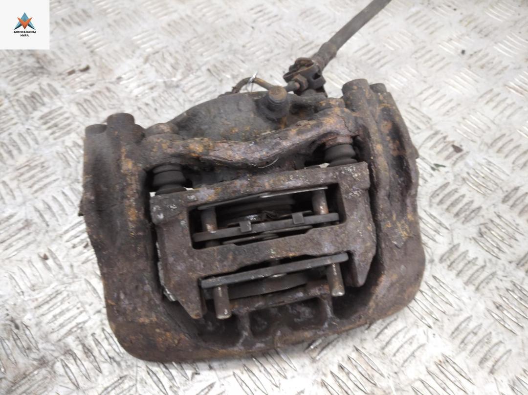 суппорт передний левый Volkswagen Transporter T4 1992, 2.4 л., дизель, МКПП, красный, микроавтобус - фото №1