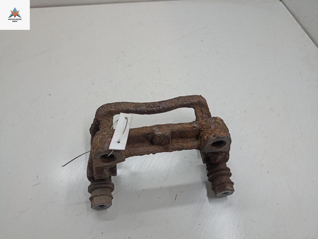 скоба суппорта Opel Astra H 2004, 1.4 л., бензин, МКПП, красный, хетчбэк 5 дв. - фото №1