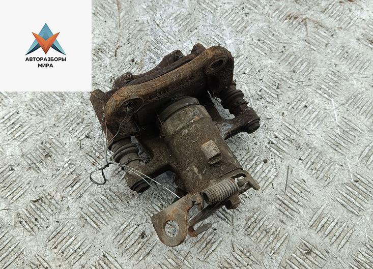 суппорт задний левый Renault Megane 2 поколение 2004, 1.6 л., бензин, МКПП, серый, хетчбэк 5 дв. - фото №1