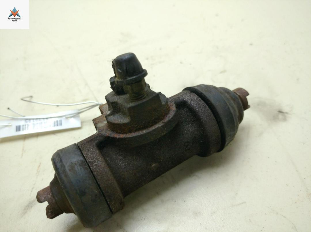 цилиндр тормозной рабочий Volkswagen Transporter T4 1994, 2.4 л., дизель, МКПП, серый, микроавтобус - фото №1