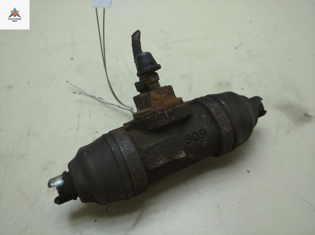 цилиндр тормозной рабочий Volkswagen Transporter T4 1994, 2.4 л., дизель, МКПП, серый, микроавтобус - фото №1