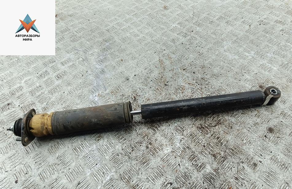 амортизатор задний левый BMW 3 серия E36 1991, 1.8 л., бензин, АКПП, синий, седан - фото №1