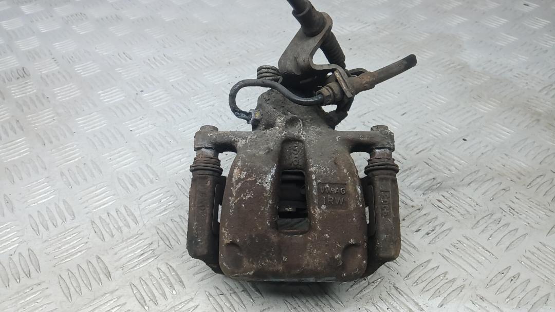 суппорт задний левый Skoda Superb 3 поколение 2015, 1.6 л., дизель, МКПП, хетчбэк 5 дв., 1K0615423M - фото №1