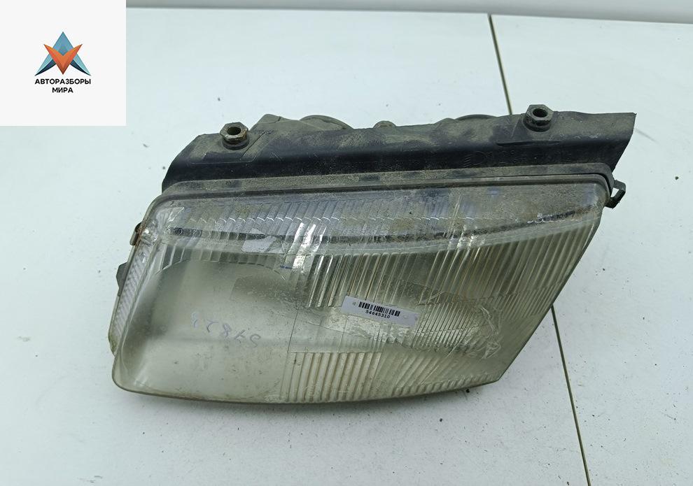 фара левая Volkswagen Passat B5 1999, 1.6 л., бензин, МКПП, зелёный, универсал, 14742500 - фото №1