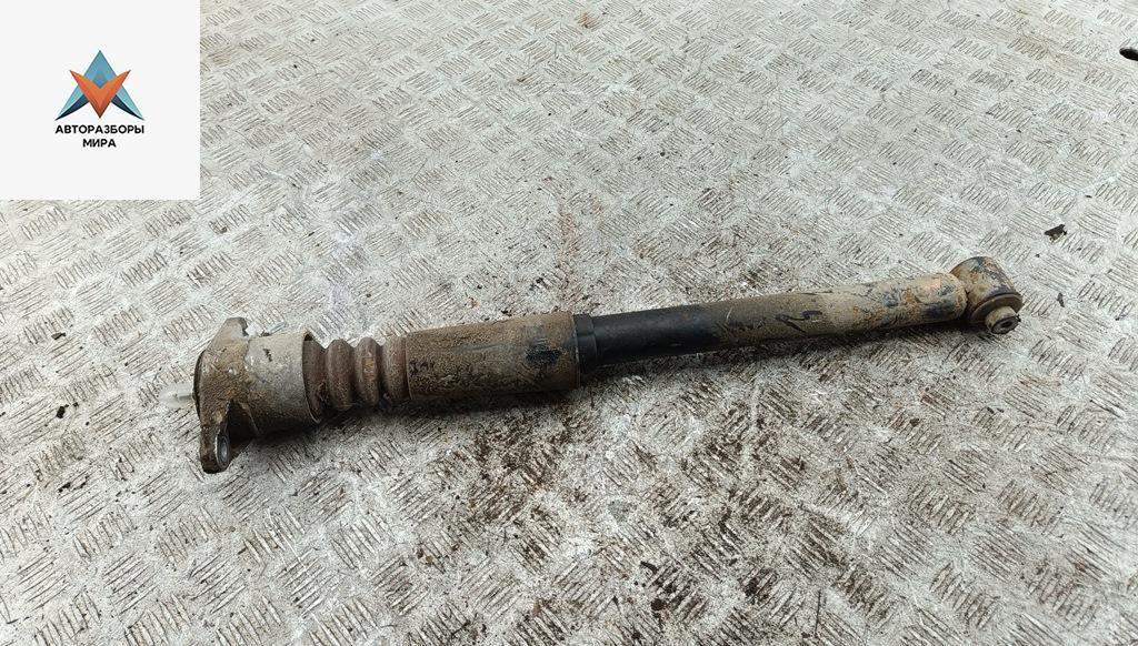 амортизатор задний левый Volkswagen Passat B5 1999, 1.6 л., бензин, МКПП, зелёный, универсал - фото №1