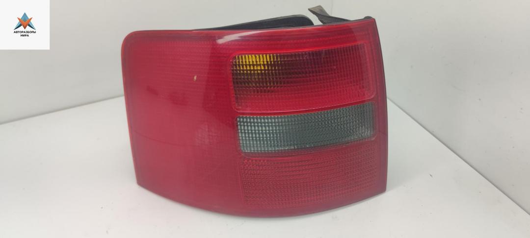 фонарь задний левый Audi A6 4B/C5 1999, 2.4 л., бензин, АКПП, чёрный, универсал, 4B9945095 - фото №1