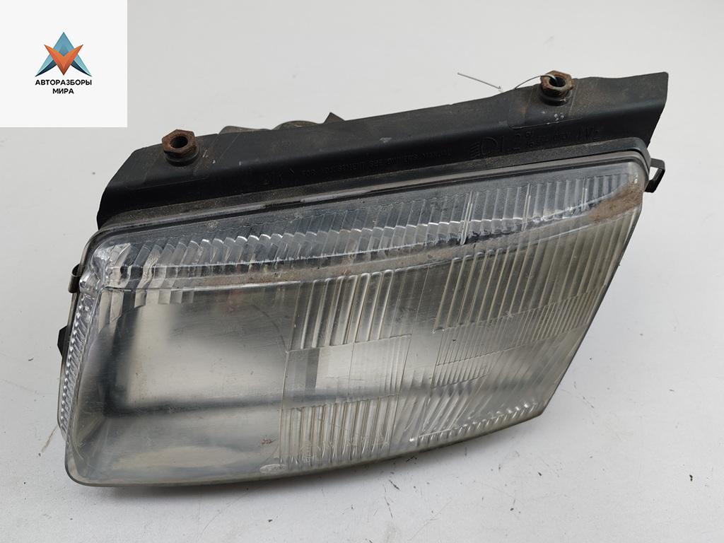 фара левая Volkswagen Passat B5 1998, 1.8 л., бензин, МКПП, синий, универсал - фото №1