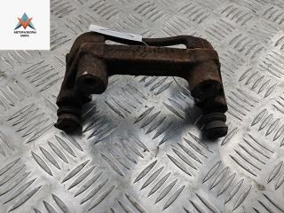 скоба суппорта Ford Mondeo 3 поколение 2002, 2.0 л., бензин, МКПП, зелёный, универсал, 0204Y01172