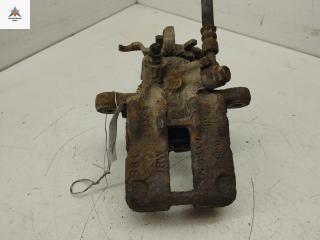 суппорт задний левый Nissan Almera N16 [рестайлинг] 2005, 1.5 л., бензин, МКПП, серый, хетчбэк 5 дв.