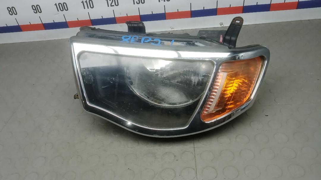 фара левая Mitsubishi L200 4 поколение 2006, 2.5 л., дизель, МКПП, пикап, 8301A689, MN146191 - фото №1