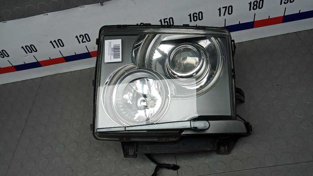 фара левая Land Rover Range Rover 3 поколение 2003, 4.4 л., бензин, АКПП, внедорожник 5 дв., XBC001330 - фото №1