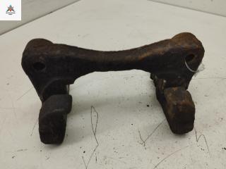 скоба суппорта Nissan Almera N16 [рестайлинг] 2005, 1.5 л., бензин, МКПП, серый, хетчбэк 5 дв.