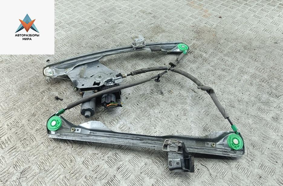 стеклоподъемник электрический передний левый Ford Focus 1 поколение 1999, 1.8 л., бензин, МКПП, серый, универсал, XS4123201 - фото №1