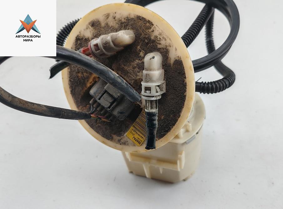 насос топливный Ford Focus 1 поколение 1999, 1.8 л., бензин, МКПП, серый, универсал, 98APAJ - фото №1