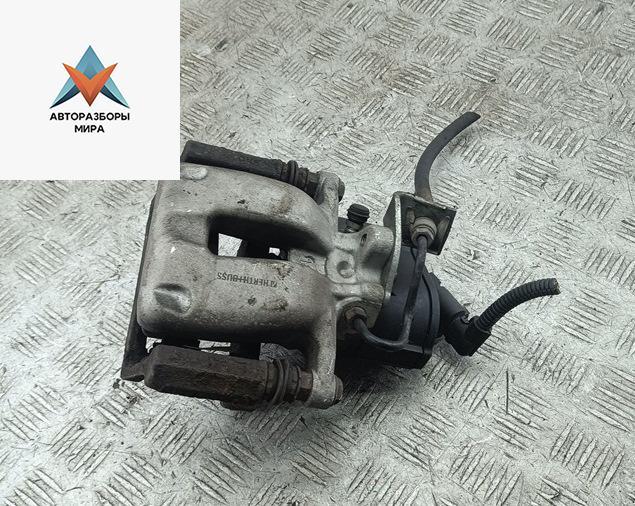 суппорт задний правый Volkswagen Passat B6 2007, 2.0 л., дизель, МКПП, серый, универсал - фото №1