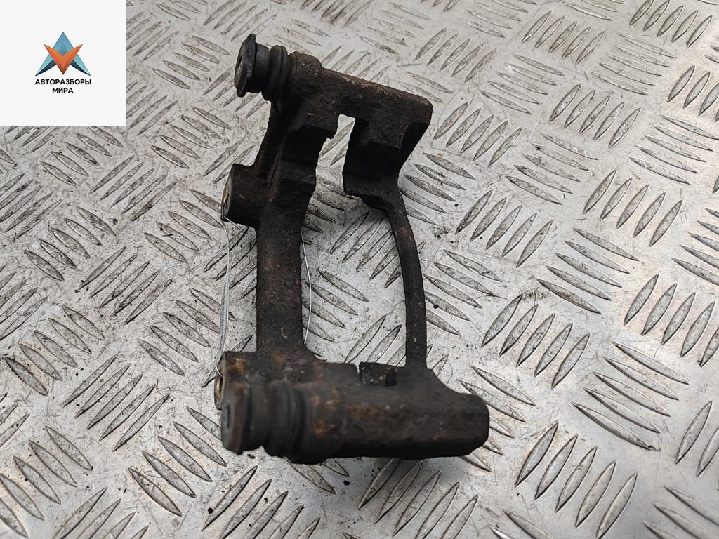 скоба суппорта Ford Mondeo 3 поколение 2002, 1.8 л., бензин, МКПП, серый, универсал - фото №1